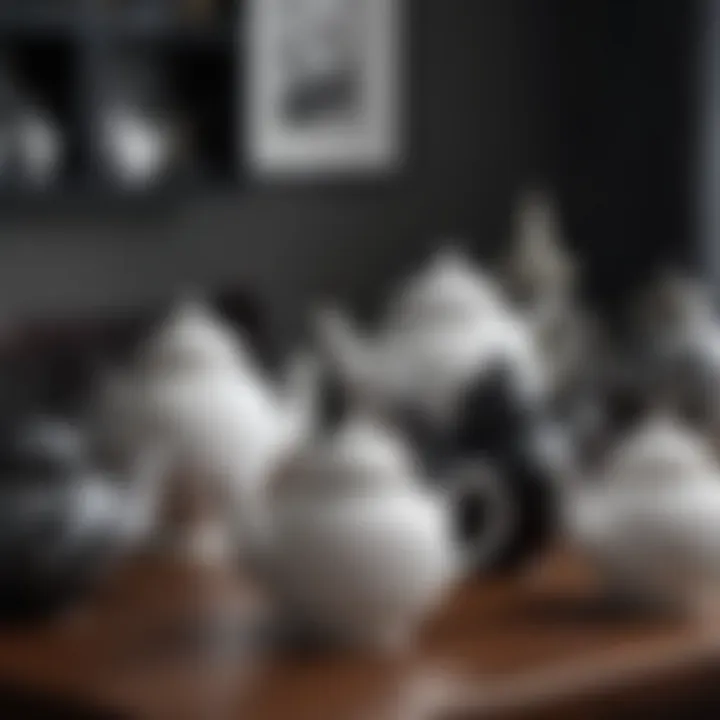 Artistic arrangement of black and white teapots